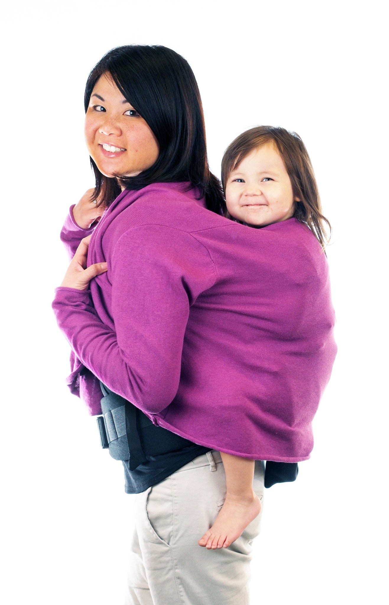 Babywearing sweater Cardimom with baby in baby carrier carrying on back
